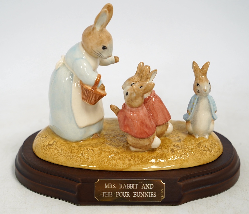 Seven John Beswick boxed figures to include Mrs Rabbit & four bunnies. Condition - good